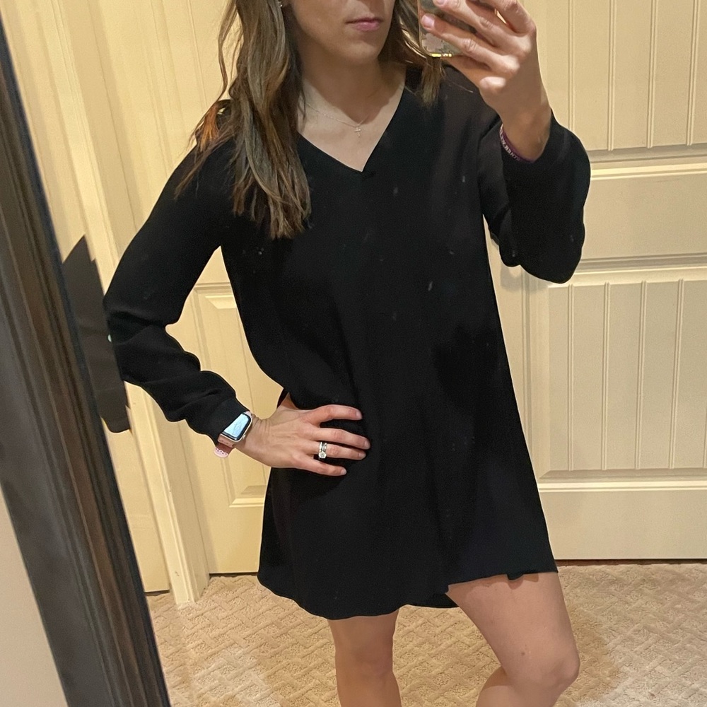 Black dress I bought while traveling in France. Long sleeve slightly puffed.